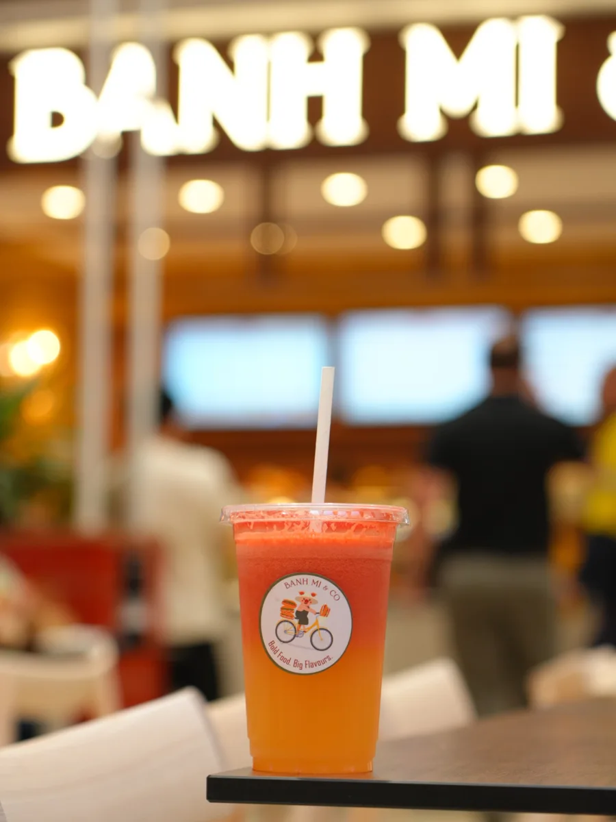Watermelon drink in a Banh Mi and Co cup